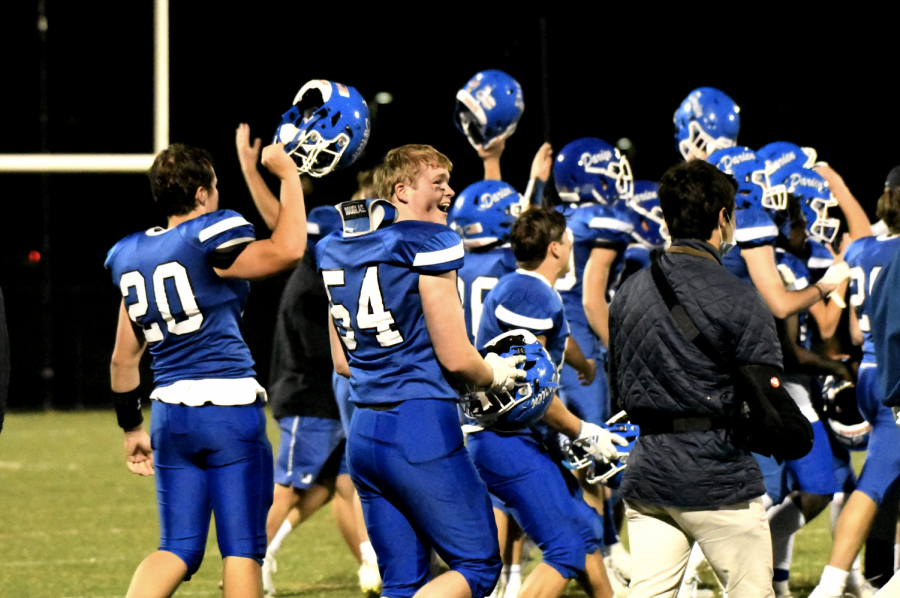 This is a picture from this years game against New Canaan. Players rallied together despite not playing a traditional season.