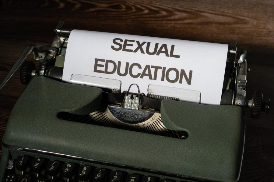Typewriter with page reading Sexual Education