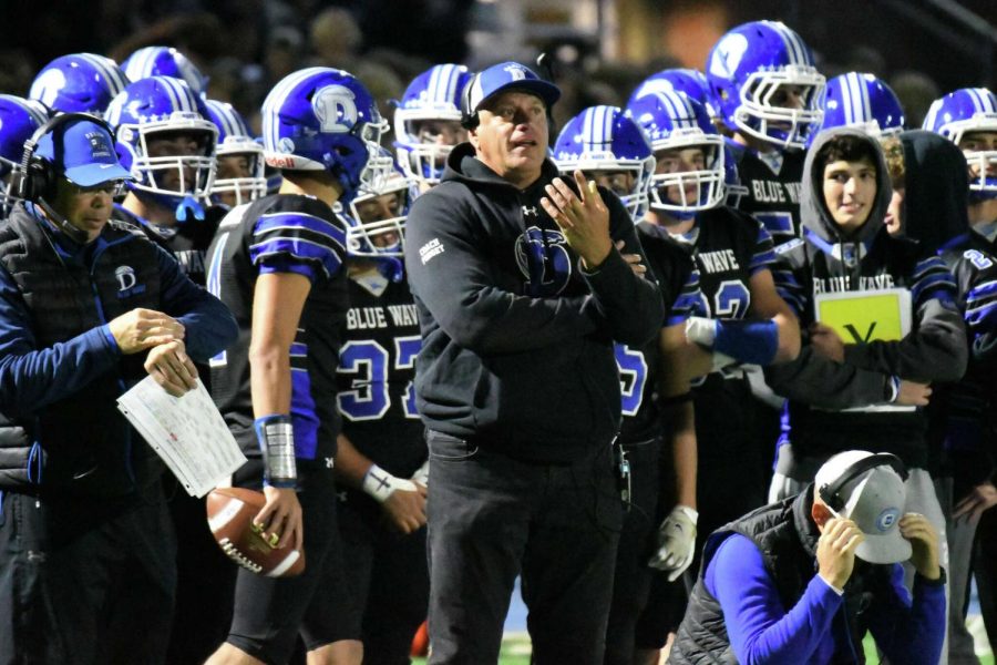 Darien head coach Mike Forget coaching on the sideline Friday Night (photo courtesy of Pete Paguaga/Hearst Connecticut)