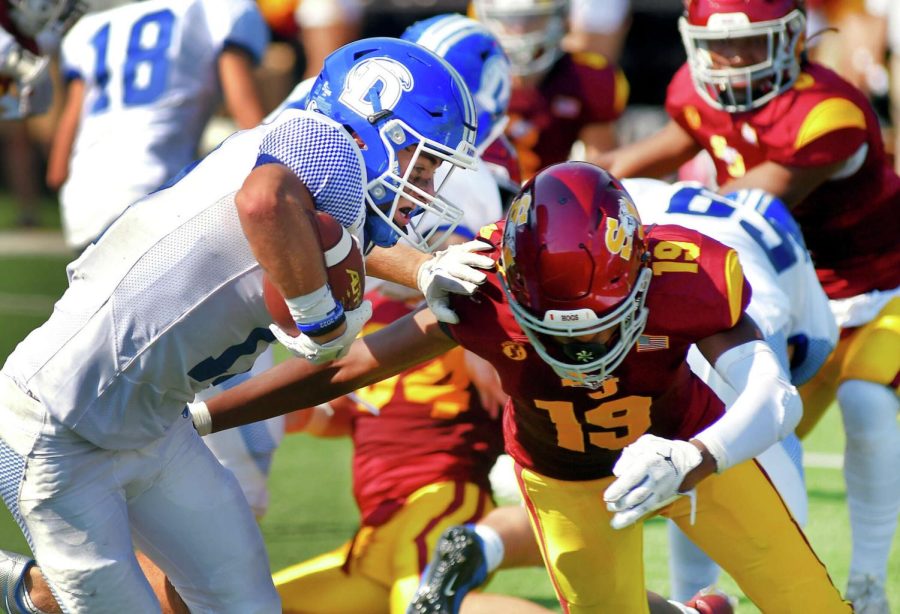 Darien's Jake Wilson rushing in week 1 at St. Joseph.