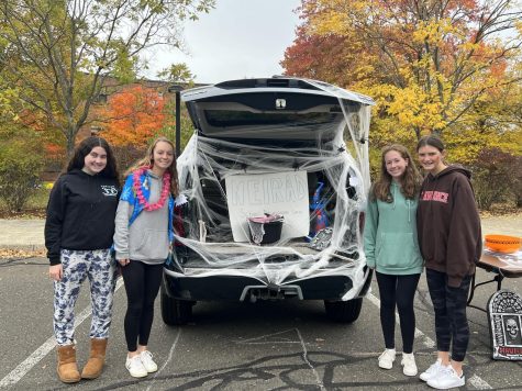 Trunk or Treat Volunteers Brenna Agarabi, Julia Blake, Rose McCarthy, Evelyn Trudel