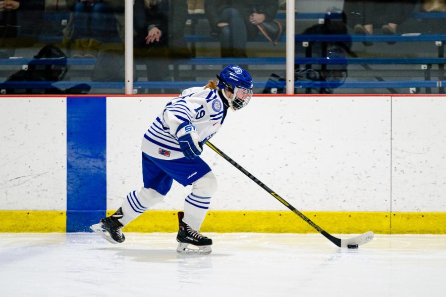 Darien senior captain Chelsea Donovan skating across the blue line in Friday Nights contest with the Cardinals.