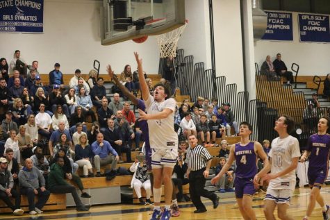 Riley Galu going up for a layup Tuesday night against the Westhill Vikings