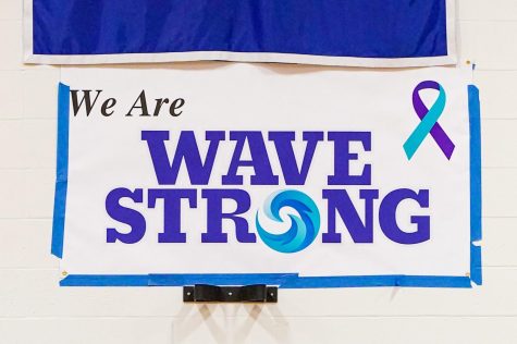 Wave Strong banner hung at center court inside the Darien High School Main Gym