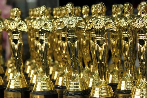 photo of many gold Oscar statuettes