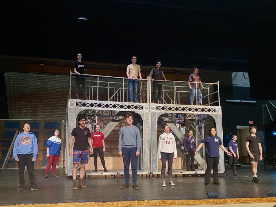 Theatre 308 - Newsies Cast stands triumphantly on the Darien High School Stage
