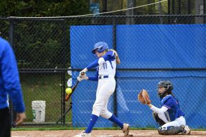 Darien sophomore hitter Izzy Oefinger crushing a three run homer in a win over the Danbury Hatters