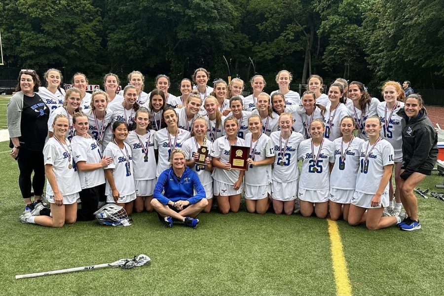 The 2023 FCIAC Girls Lacrosse Champion Darien High School Blue Wave after the win over New Canaan at Cardinal Stadium.