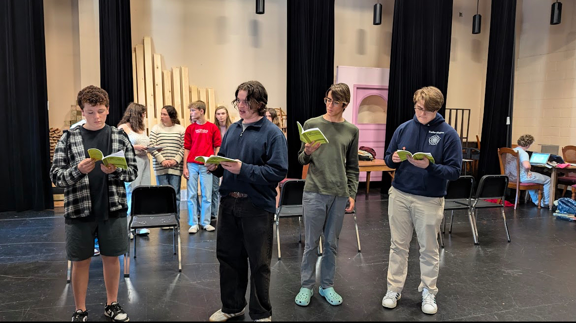 Cast members rehearse blocking and lines in the Little Theater recently. 