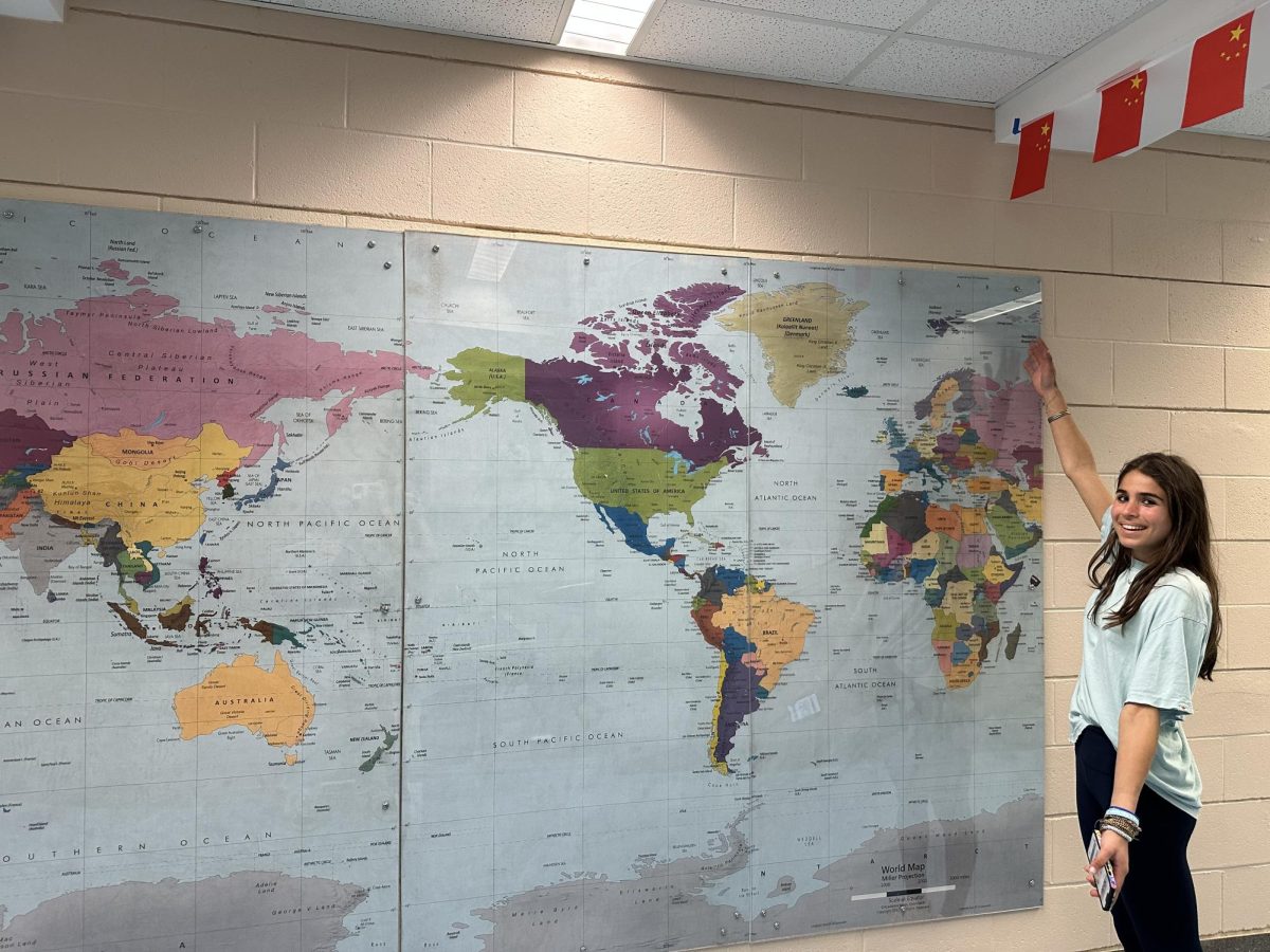 Dedicated member Athena Ogle leads a competitive race to naming countries' relative locations, using the map as a key. 