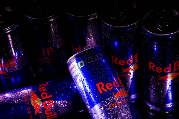 Seven cans of a popular brand of energy drink named "Red Bull"