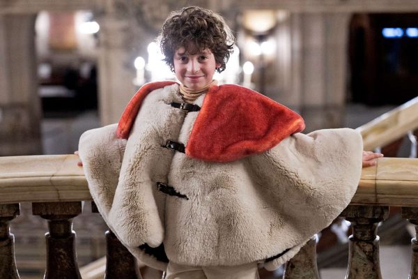 Max awaiting his big debut at Paris Fashion week in his iconic fully coat! (Blanca CRUZ / AFP via Getty)